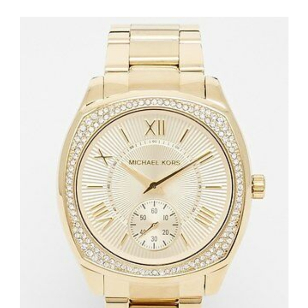 1/7

Michael Kors Women's Bryn Gold-Tone Watch .
